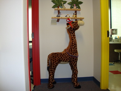Photo of giraffe at the office of pediatric dentists - Drs. Michael and Clyde Yost in San Antonio, TX